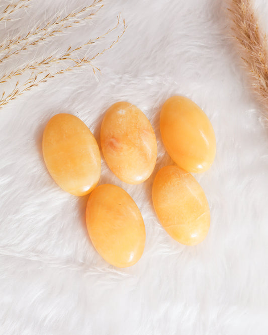 Orange Calcite Palm stones