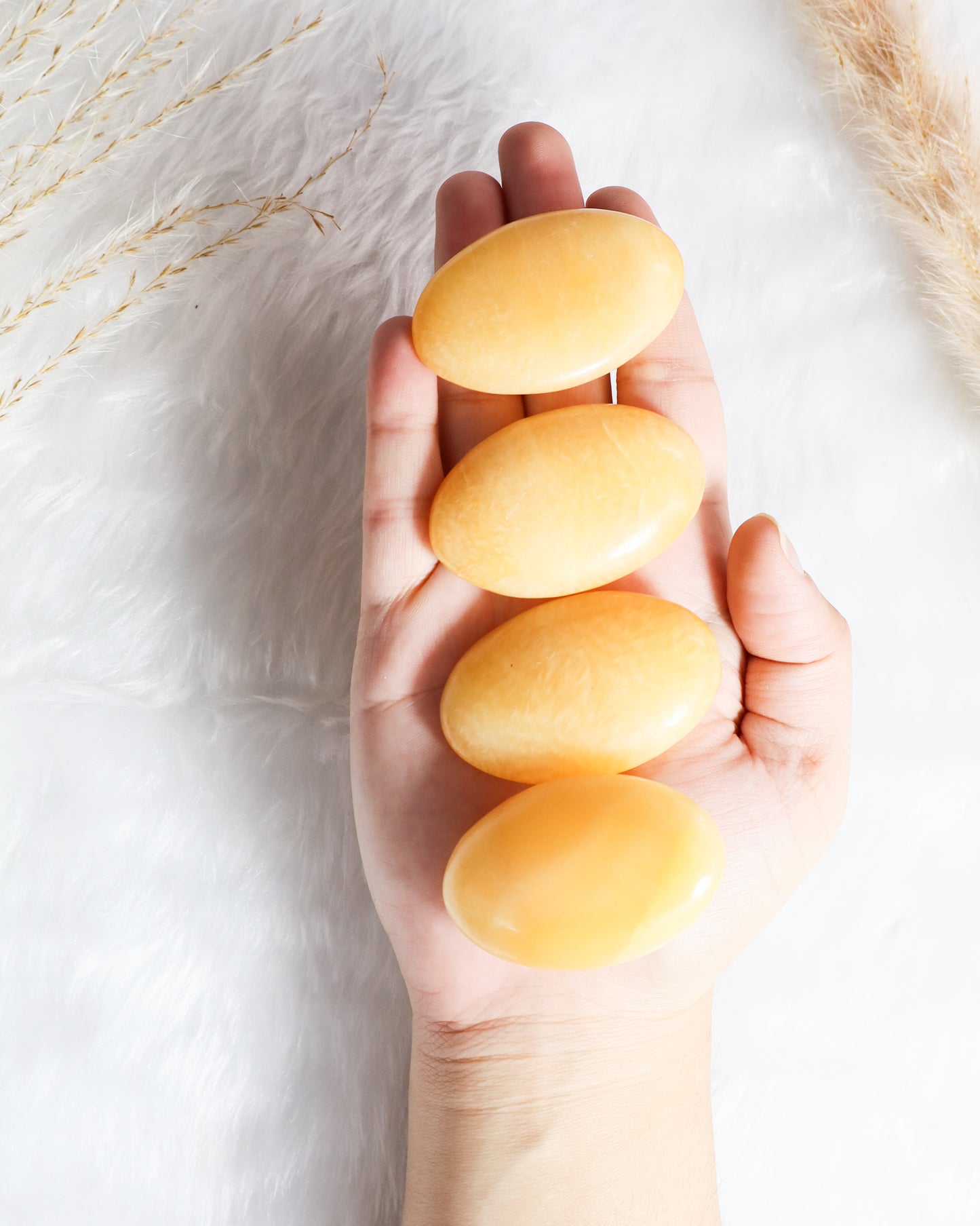 Orange Calcite Palm stones